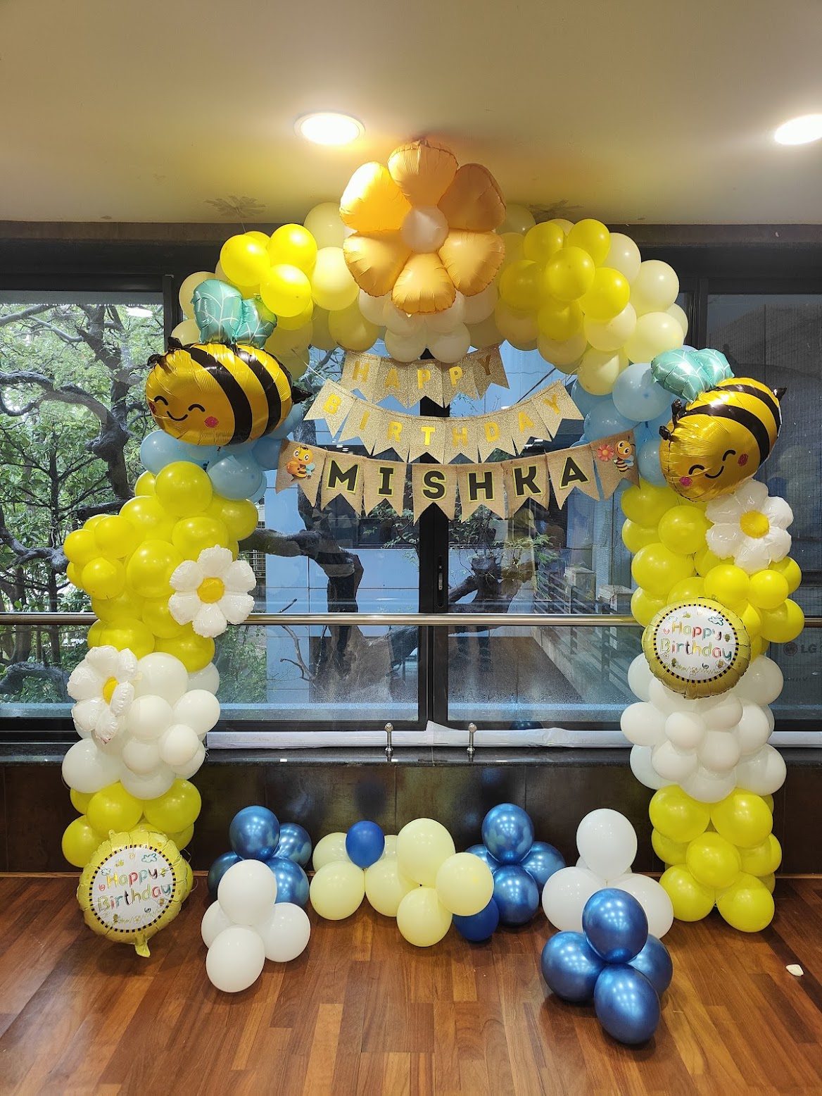 Bumble bee theme balloon arch decor