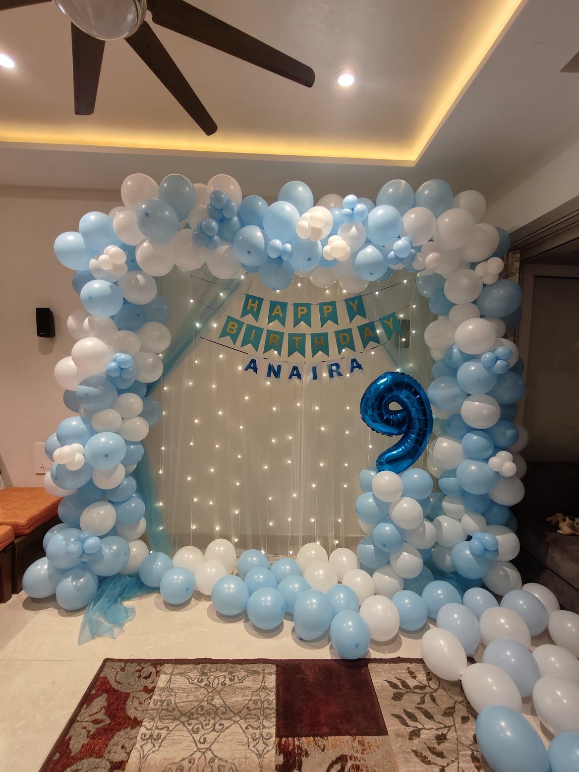 Blue and white balloon arch home decor